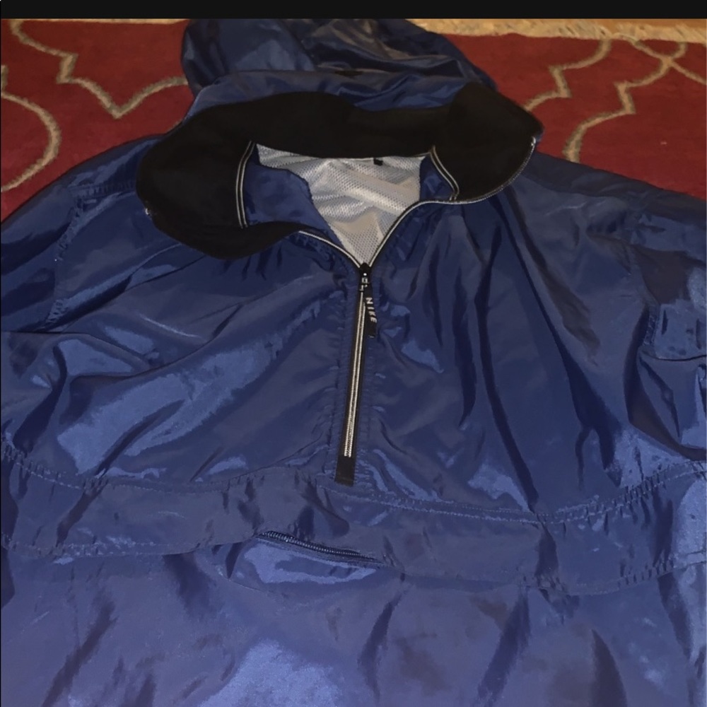 Nike style blue running jacket